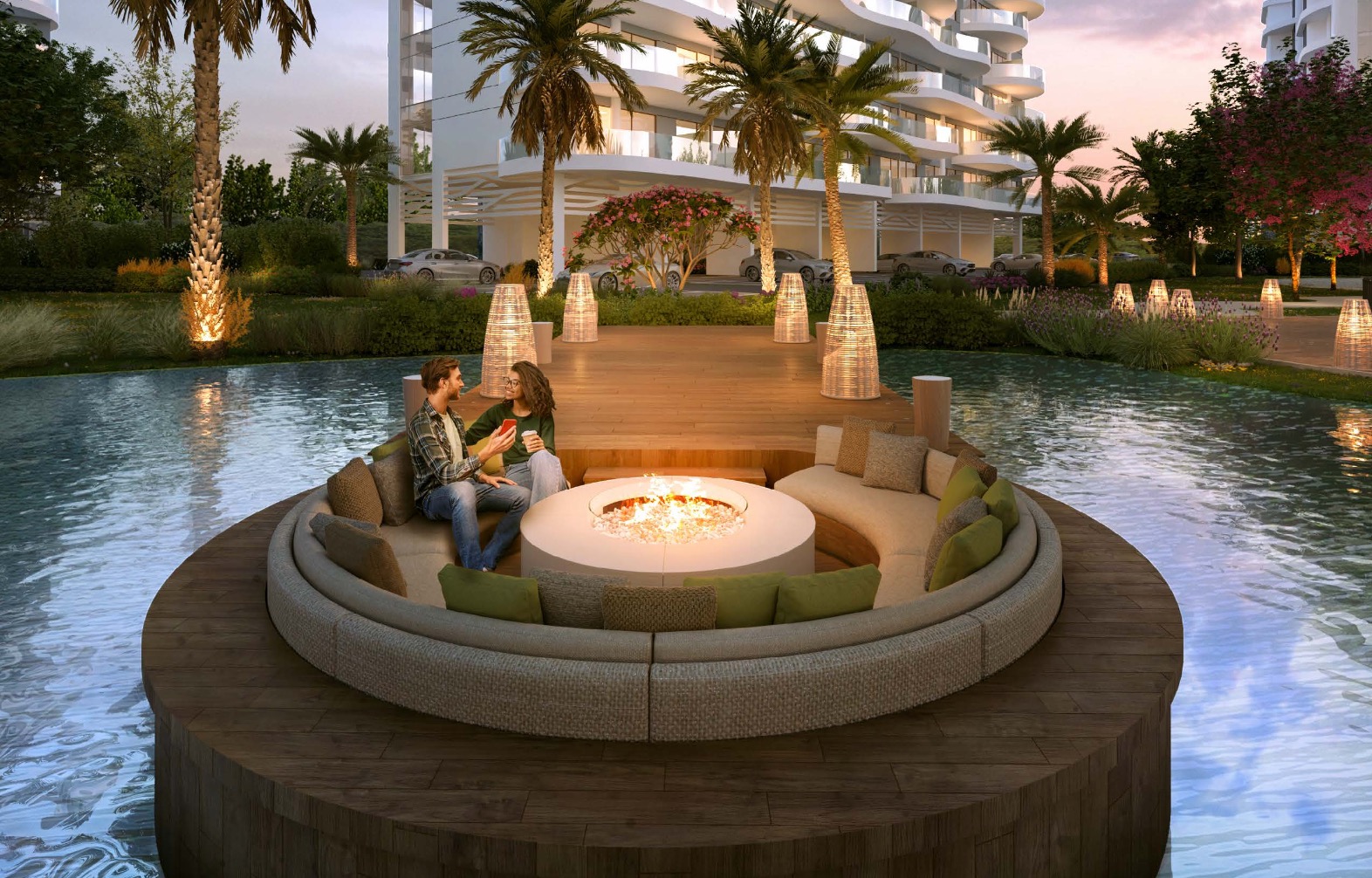 Round sunken lounge with fire pit surrounded by water